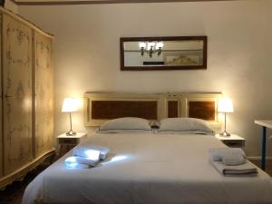 Posteľ alebo postele v izbe v ubytovaní Montello Guest House & Apartment