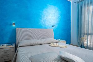 Posteľ alebo postele v izbe v ubytovaní B&B Pietre Preziose