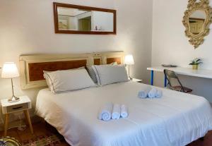 Posteľ alebo postele v izbe v ubytovaní Montello Guest House & Apartment