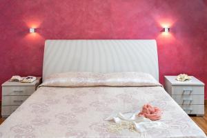Posteľ alebo postele v izbe v ubytovaní B&B Pietre Preziose