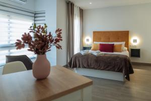 A bed or beds in a room at A&M CAVA