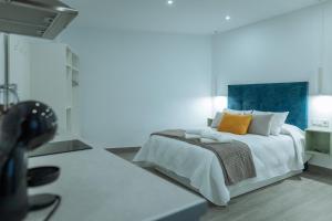 A bed or beds in a room at A&M CAVA