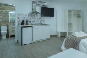 A kitchen or kitchenette at A&M CAVA