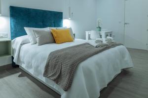 A bed or beds in a room at A&M CAVA