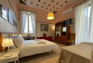 Posteľ alebo postele v izbe v ubytovaní Montello Guest House & Apartment