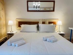 Posteľ alebo postele v izbe v ubytovaní Montello Guest House & Apartment