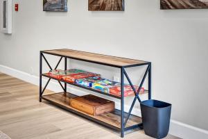 a shelf with food on it next to a wall at Two Bedroom - King in Master Heart of Downtown Vista in Vista