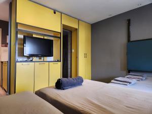Postel nebo postele na pokoji v ubytování Amdar Hostel