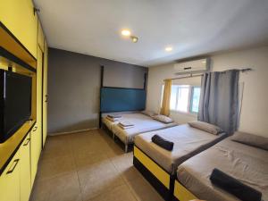Postel nebo postele na pokoji v ubytování Amdar Hostel