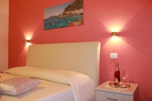 Posteľ alebo postele v izbe v ubytovaní B&B Pietre Preziose