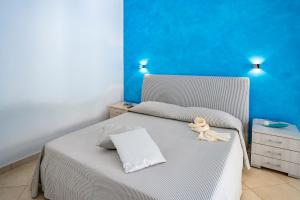 Posteľ alebo postele v izbe v ubytovaní B&B Pietre Preziose