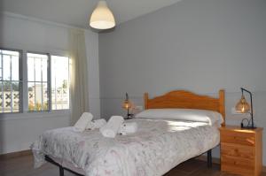 A bed or beds in a room at Casa Mar i Sol