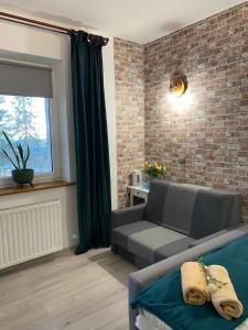 Część wypoczynkowa w obiekcie Hotel Restauracja U Guta