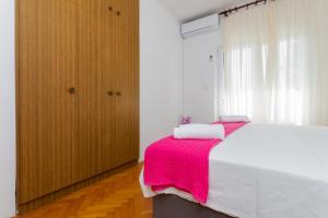 Postel nebo postele na pokoji v ubytování Apartment Zdravka