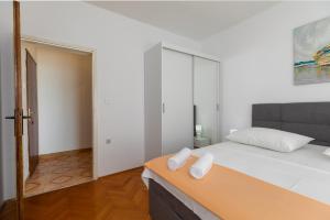 Postel nebo postele na pokoji v ubytování Apartment Zdravka