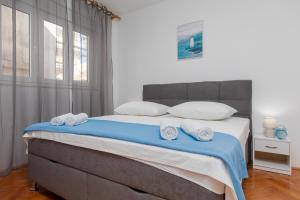 Postel nebo postele na pokoji v ubytování Apartment Zdravka