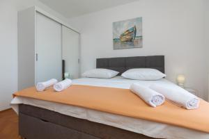 Postel nebo postele na pokoji v ubytování Apartment Zdravka
