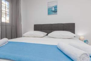 Postel nebo postele na pokoji v ubytování Apartment Zdravka