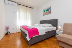 Postel nebo postele na pokoji v ubytování Apartment Zdravka