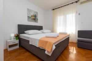 Postel nebo postele na pokoji v ubytování Apartment Zdravka