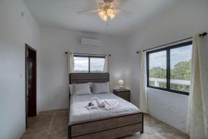 Ένα ή περισσότερα κρεβάτια σε δωμάτιο στο Villa Sea Lux