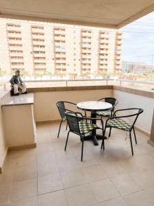 Balkon lub taras w obiekcie Jardines al Mar piscina y garaje