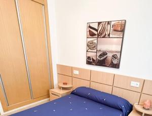 Łóżko lub łóżka w pokoju w obiekcie Jardines al Mar piscina y garaje