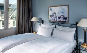 Postel nebo postele na pokoji v ubytování Hotel Elbflorenz Dresden + 22 fotografií