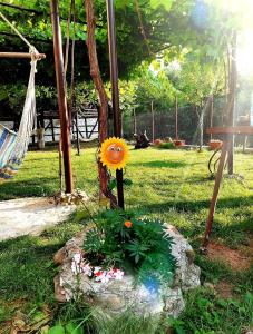 A garden outside Guest House By The River