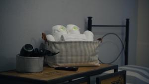 a basket filled with towels on a table at Piccolo Borgo in Chiavari