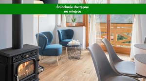 Posezení v ubytování TWOJA CHATA Apartamenty pod niebem zarezerwuj na podhalami pl