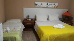 Postel nebo postele na pokoji v ubytování Hotel Fazenda Terra Ramos