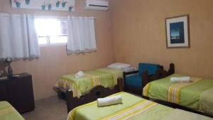 Postel nebo postele na pokoji v ubytování Hotel Fazenda Terra Ramos