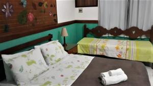 Postel nebo postele na pokoji v ubytování Hotel Fazenda Terra Ramos + 37 fotografií