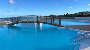 Bazén v ubytování Rêves de Tropiques - Grands studios avec piscine vue océan accès plage direct nebo v jeho okolí