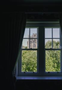 a window with a view of the tower of london at 40Winks in Durham