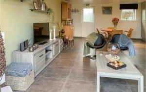 a living room with a kitchen and a dining room at Awesome Home In Diksmuide With Wifi in Diksmuide