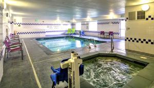 a large indoor swimming pool in a building at Fairfield Inn Boise Airport in Boise