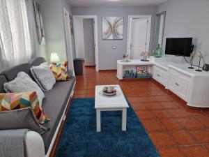 TV a/nebo společenská místnost v ubytování MARODY HOUSE ATICO A