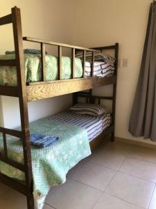 a couple of bunk beds in a room at Vista Andes VII in Ciudad Lujan de Cuyo