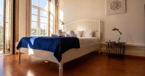 En eller flere senge i et værelse på Casa do Recanto - Loft vista rio