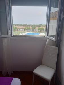 Bazén v ubytování Hostal Los Mellizos nebo v jeho okolí