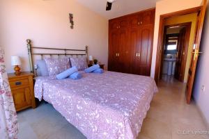 Postel nebo postele na pokoji v ubytování Tenerife lizards - duplex in the first line
