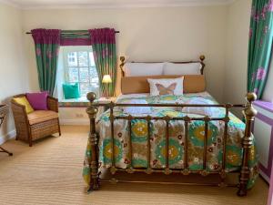 Кровать или кровати в номере High Moor Cottage