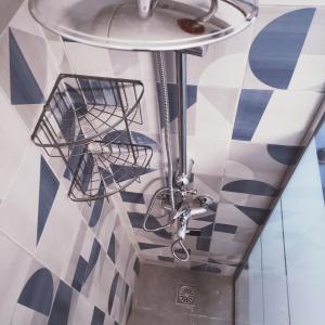 a bathroom with a sink and a mirror at Seaside apartment in Agioi Theodoroi