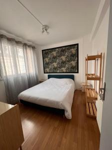 Posteľ alebo postele v izbe v ubytovaní Cosy T2 - Proche centre villetransports