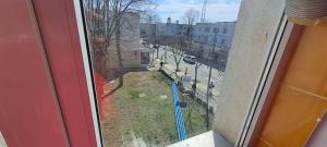 a view of a street from a window of a building at Apartament DR in Mangalia