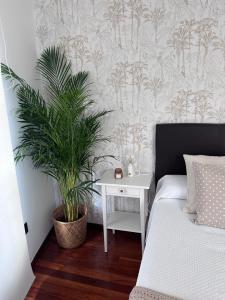 A bed or beds in a room at La Austera