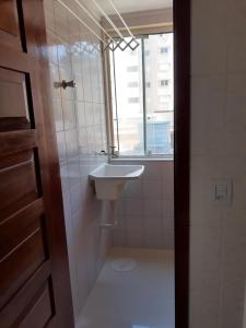 Koupelna v ubytování Apartamento Mari em Capão da Canoa RS