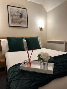 Postel nebo postele na pokoji v ubytování St Michaels Inn